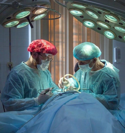 Surgeons operating