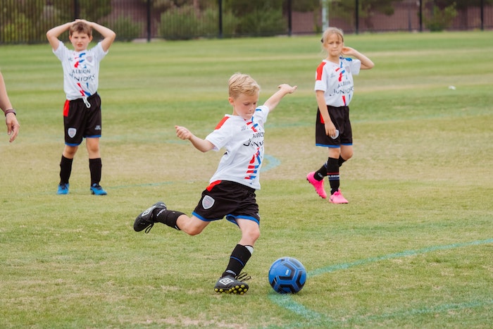 Children playing football